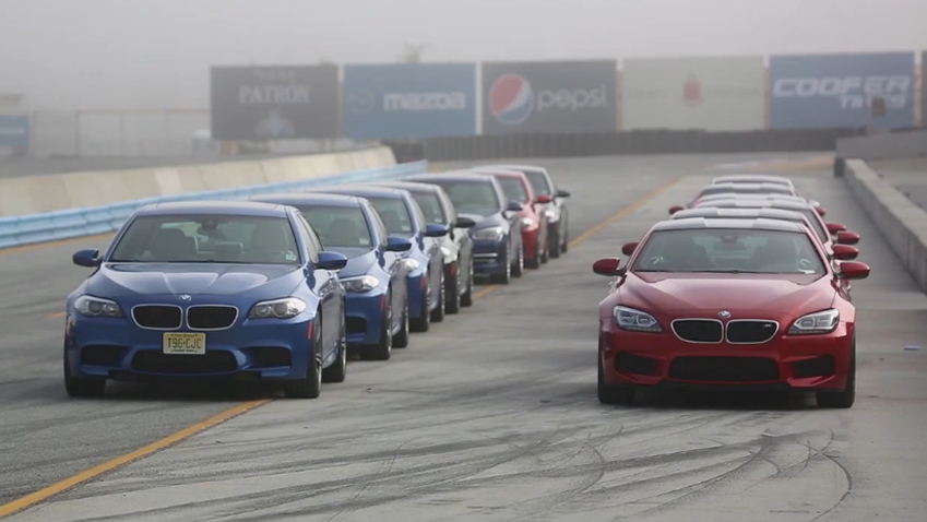 BMW M5s and M6s, lined up for track day action at Laguna Seca