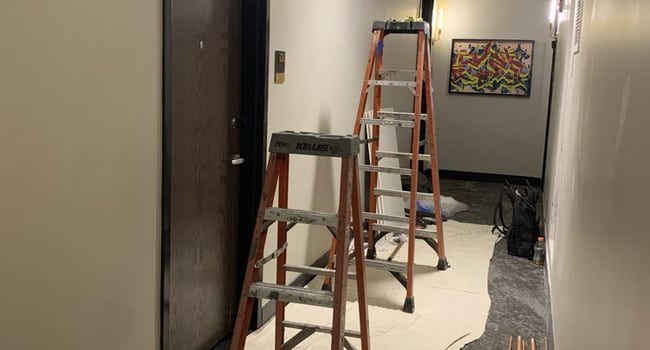 Unannounced construction in hallway still going on at 7 PM