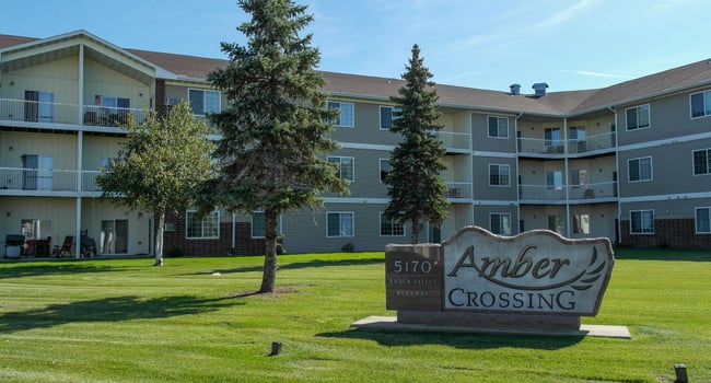 The front yard at Amber Crossing, featuring the Amber Crossing monument and sign