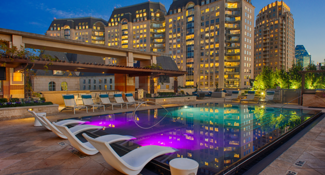 Heated Rooftop Infinity-Edge Pool with Aqua Lounge at The Ashton in Uptown Dallas